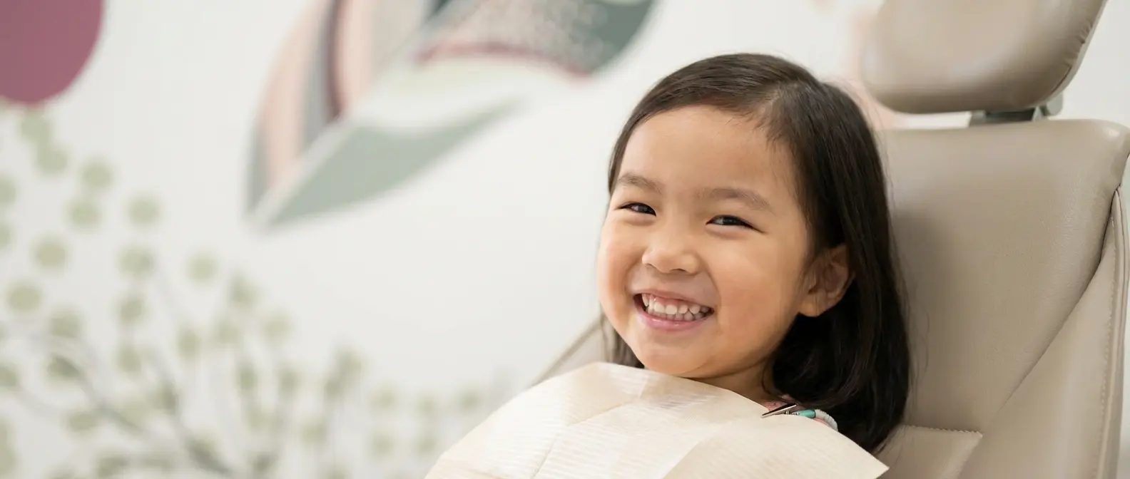 Brian_clever_make_me_a_photorealistic_image_of_a_smiling_asian_kid_at_the_dent_7a83fdf6-02ae-4e16-8968-4bbb2aeec039